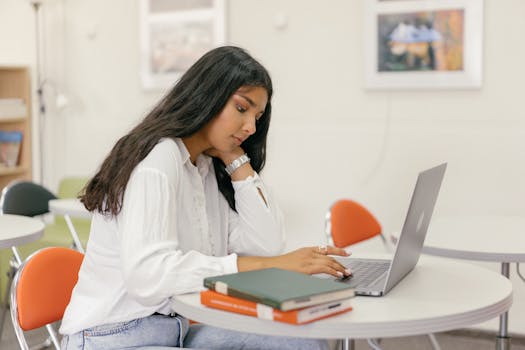 student studying with digital tools