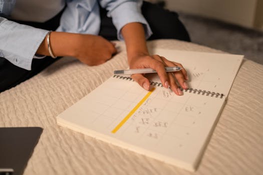 student using a planner to manage time effectively